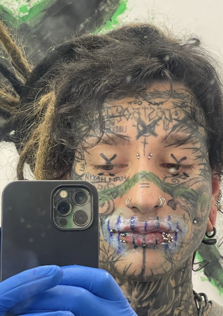 Tattoo artist August Chupakabra reveals pain of tattooing red vine across forehead rated 8/10. The 27-year-old from Poland spent two hours creating his latest extreme body art.
