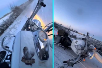Content creator Sammy Farrow falls off snow-covered motorbike in slow motion during icy first day back commute - foolhardy ride caught on camera goes viral with 1.6m views.