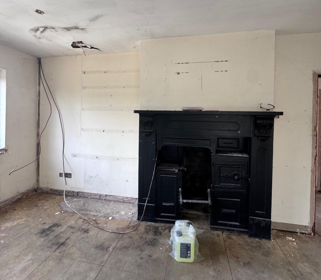 Couple buy derelict house on industrial estate for £330,000 and transform it into dream home with sauna, hidden playroom and space for 50 cars in Derbyshire.