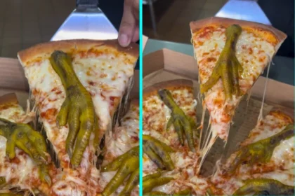 Mexican pizzeria Holy Pizza Dispensary divides internet with controversial Witch's Feet Pizza topped with eight steamed chicken feet, one for each slice on margherita base.