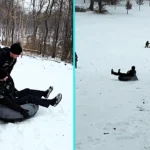 Police officer launched down snowy hill in rubber ring goes viral after hitting bump and crashing onto his back - 89,000 likes as viewers joke about service weapon.