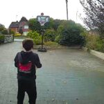An 11-year-old schoolboy was left stunned after nailing an incredible 27ft basketball trick shot in his driveway, with the jaw-dropping moment perfectly captured on the family’s Ring doorbell camera