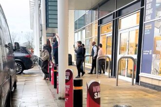 Shoppers were stunned after NBA legend Shaquille O’Neal was spotted towering over stores at a north London retail park while filming a DFS advert and playing hide and seek