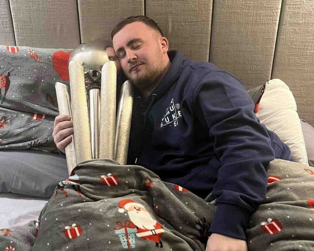 Psychic pig Truffle correctly predicted Luke Littler's second world darts championship win by choosing his feed bucket at Ouseburn Farm, Newcastle, repeating her accurate 2024 prediction.