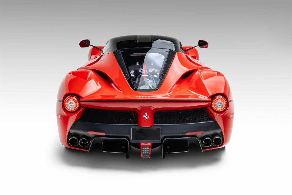 A celebrity loved Ferrari LaFerrari with under 2,000 miles is heading to auction at £3.6m, boasting Rosso Corsa styling, elite ownership history and hypercar rarity.
