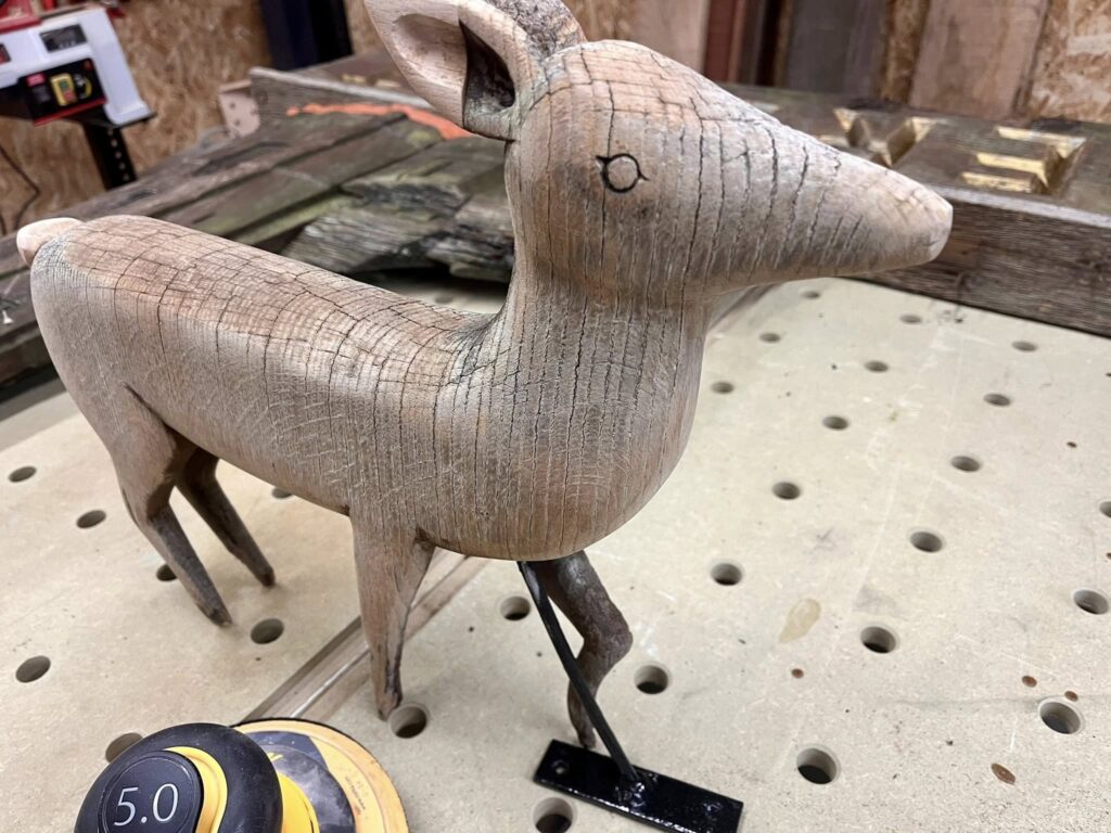 Lorry driver spends six weeks hand-restoring 50-year-old Hethersett village sign near Norwich. Self-taught Craig Jenkins saved the rotten oak carving for locals.