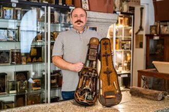 Vampire hunting kit complete with stakes, crosses and holy water found in violin case at Polish museum - 1950s Polish origin makes it unique as most were German-made.