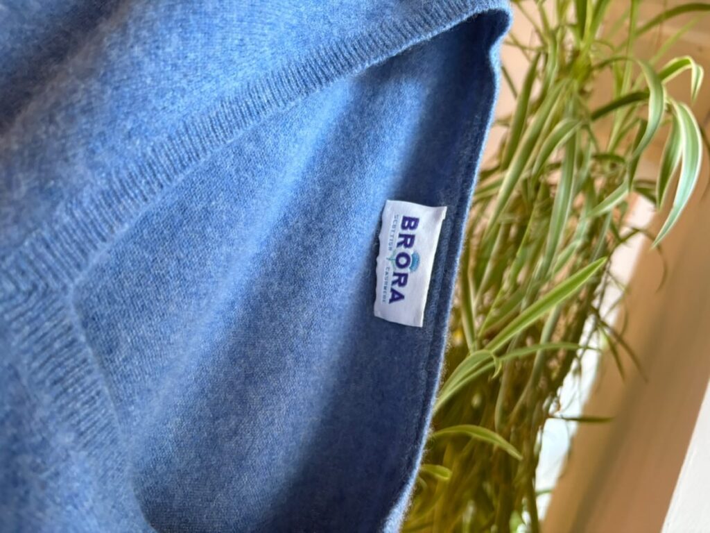 Shopper finds £400 Brora cashmere jumper, as worn by Claudia Winkleman on The Traitors, in charity shop for just £8 and says she couldn't believe her eyes.