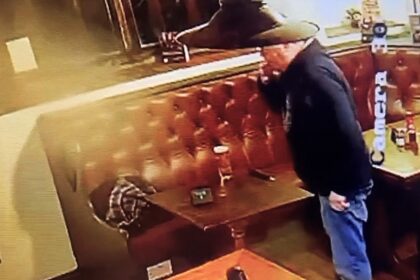 CCTV at a 15th century haunted pub shows a full pint sliding off a table by itself, reviving chilling ghost stories, past deaths and a planned paranormal investigation.