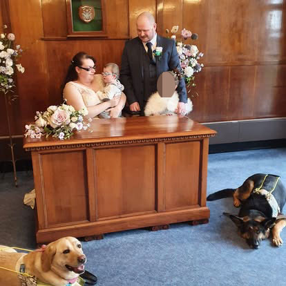 Woman who lost her sight found love when her guide dog Bailey introduced her to Martin and his guide dog Diesel, now married with a son who also has cataracts.