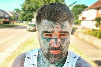 Britain's most tattooed man King of Ink Land celebrates four years without new ink after giving up tattoos to pay off his mortgage, with just £5,000 remaining on his Birmingham home.