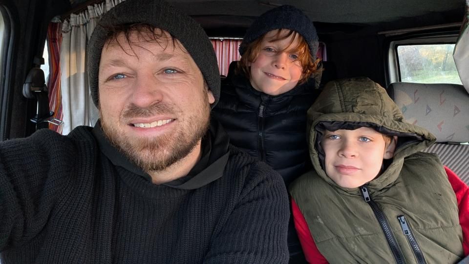 Single dad of three reveals how ditching a house for life on a narrowboat cut costs, healed grief, and gave his boys an adventurous childhood afloat