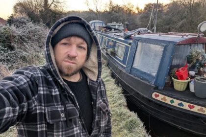 Single dad of three reveals how ditching a house for life on a narrowboat cut costs, healed grief, and gave his boys an adventurous childhood afloat