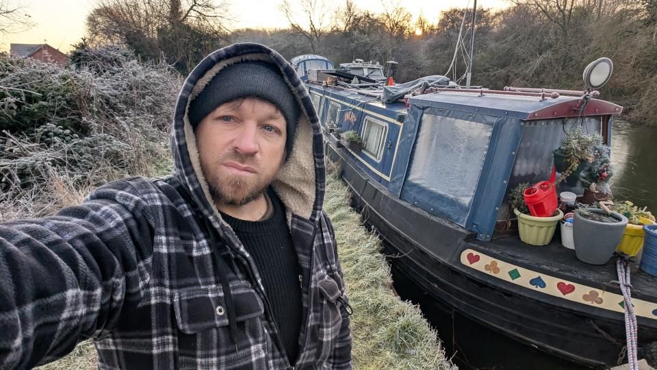 Single dad of three reveals how ditching a house for life on a narrowboat cut costs, healed grief, and gave his boys an adventurous childhood afloat