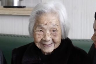 101-year-old night owl stays up until 2am watching TV and eating crisps, claiming it's her secret to longevity. Chinese woman still has full set of teeth and wakes at 10am.