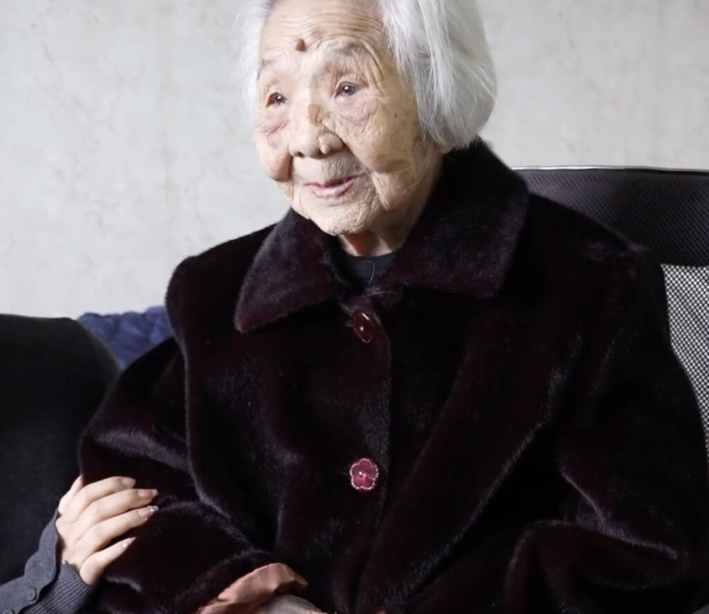 101-year-old night owl stays up until 2am watching TV and eating crisps, claiming it's her secret to longevity. Chinese woman still has full set of teeth and wakes at 10am.
