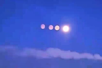Rare paraselene phenomenon created quadruple moon illusion over St Petersburg, Russia. Ice crystals in frosty atmosphere bent light to produce stunning display.