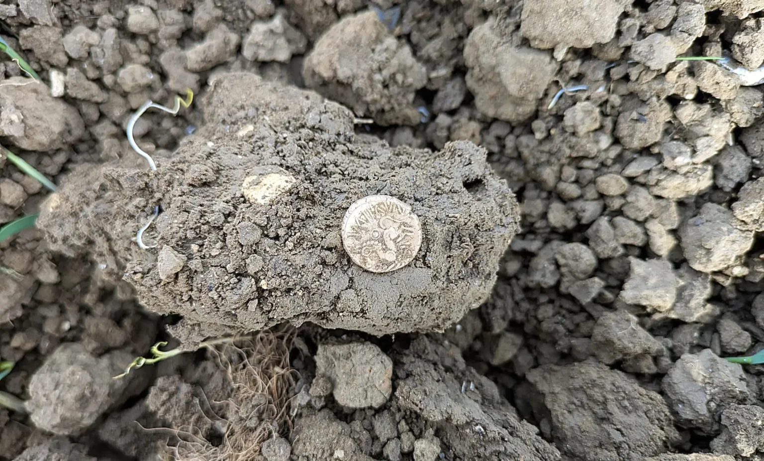 A British metal detectorist unearthed 17 rare Iron Age gold coins in a Suffolk field, a remarkable hoard linked to ancient kings that could fetch £25,000 at auction