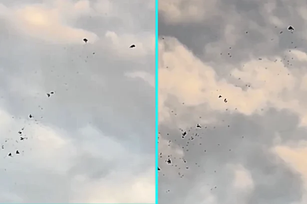 A fleet of mysterious objects filmed over the Hudson River has sparked UFO frenzy, with more than 100 shapes drifting in formation as alien file claims resurface.