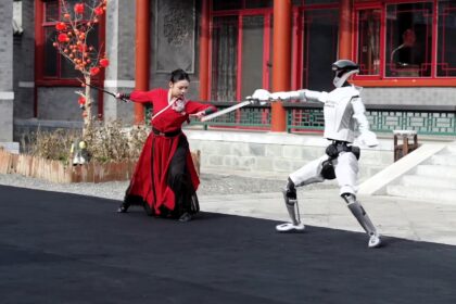 Humanoid robot L7 filmed wielding sword with terrifying expertise for Chinese New Year dance. The 5ft 6in bot with 55 moving joints leaves viewers fearing robot future.