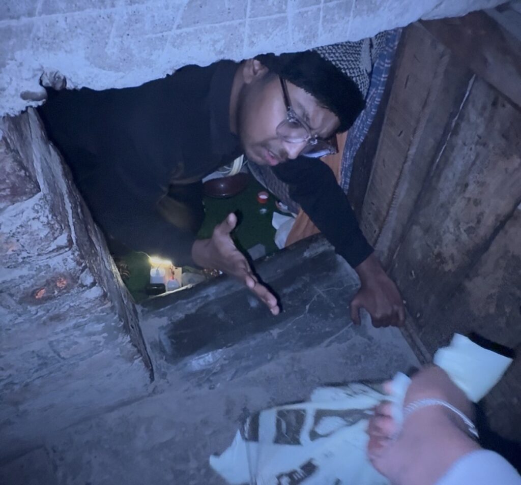 A man living in a tiny concrete box with no windows and a ceiling so low he can't stand up pays just £40 a month in rent - and turned his cramped space into a viral influencer career.