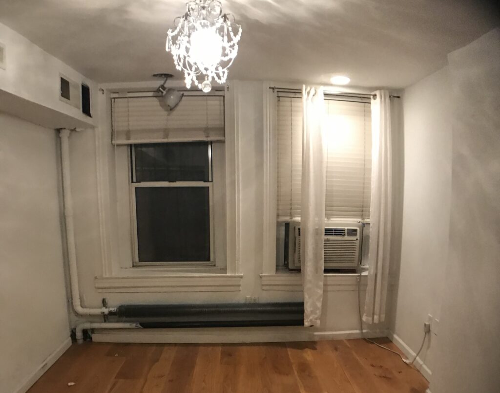 Woman pays over £1m to live next to bin bags full of rubbish in New York City but says she has zero regrets - her stunning West Village apartment has a cosy Parisian vibe.