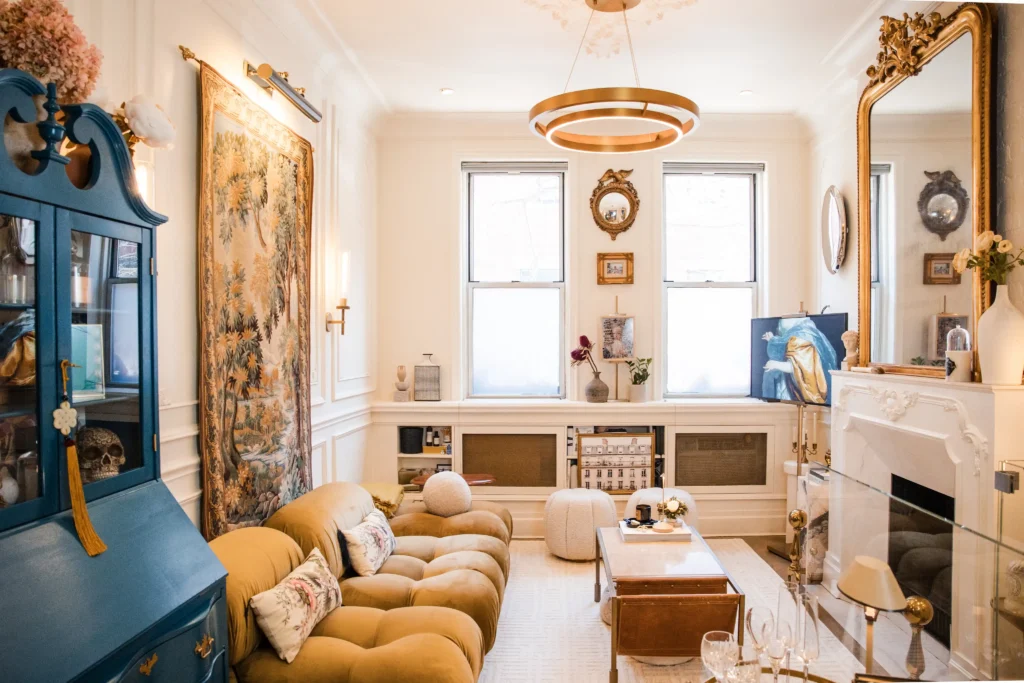 Woman pays over £1m to live next to bin bags full of rubbish in New York City but says she has zero regrets - her stunning West Village apartment has a cosy Parisian vibe.