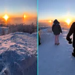 Tour guide stuns viewers with video of a rare ‘three suns’ illusion glowing over snowy Murmansk at sunrise as a parhelion forms from ice crystals above the bay