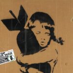 Early Banksy anti Iraq War placards Bomb Hugger and Yellow Chopper have sold for £1,800 each, rare relics from the 2003 London protest march.