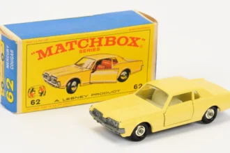 Rare 1968 Matchbox Mercury Cougar toy in wrong pale yellow color sells for world record £22,050. Early casting produced briefly before change to lime green at Vectis Auctions.