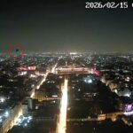 A city webcam filmed a mysterious spherical object gliding over Mexico City at 4:18am, sparking UFO theories online as officials stay silent on the viral sighting