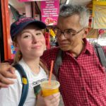 Couple with 25-year age gap who met on Zoom games night hit back at trolls calling their love "disgusting" - Jenn, 27, says husband Tom, 51, fits her "perfectly".