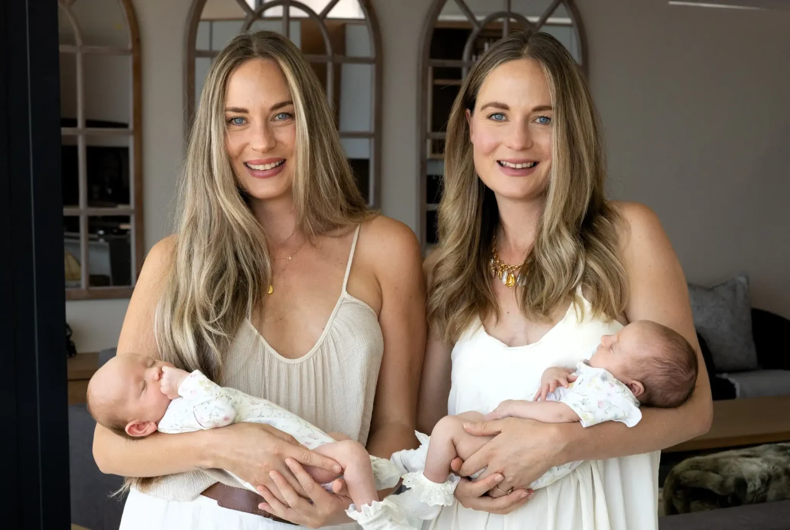 Identical twins defied incredible odds by welcoming baby girls on the exact same day in the same hospital - which also happened to be their own 32nd birthday.