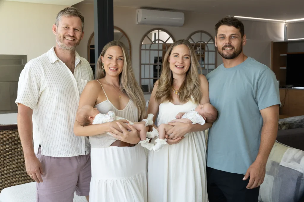 Identical twins defied incredible odds by welcoming baby girls on the exact same day in the same hospital - which also happened to be their own 32nd birthday.