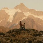 Junebug Weddings reveals 2026’s best engagement photos, with couples embracing cinematic backdrops from misty mountains to Lake Como for unforgettable romantic scenes