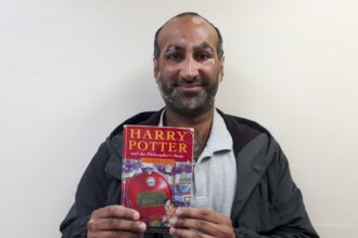 A rare first edition Harry Potter book gifted in childhood could fetch thousands at auction, with printing errors boosting its value and collector appeal