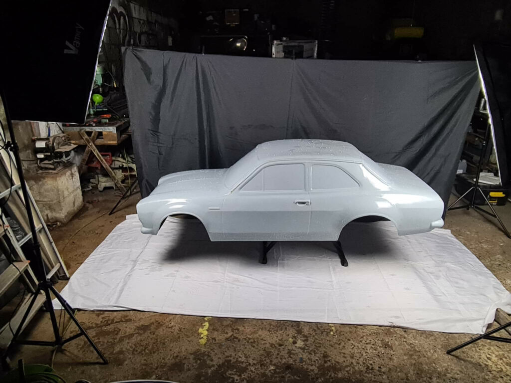 A dad builds £5,000 miniature cars and lets his six-year-old son test drive them, with the stunning half-scale motors wowing fans online with their realism.