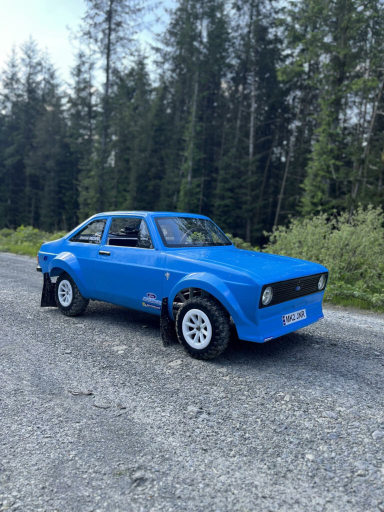 A dad builds £5,000 miniature cars and lets his six-year-old son test drive them, with the stunning half-scale motors wowing fans online with their realism.