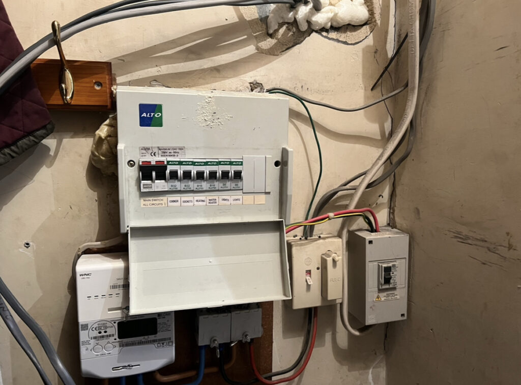 An electrician found black ‘eggs’ on a fuse board, only to discover it was insulation and foam from a DIY fail, creating a serious fire hazard in the Surrey home.