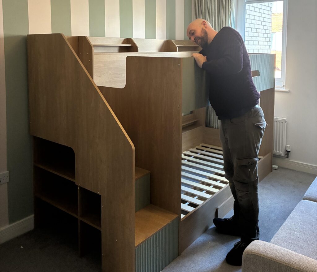 A former finance worker ditched office life to build flat-pack furniture and now earns up to £50,000 a year, enjoying flexible hours and a more fulfilling career.