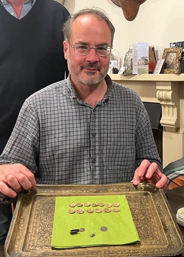A British metal detectorist uncovered a rare Iron Age gold coin hoard in a Suffolk field, with the remarkable treasure later selling at auction for an impressive £33,200.