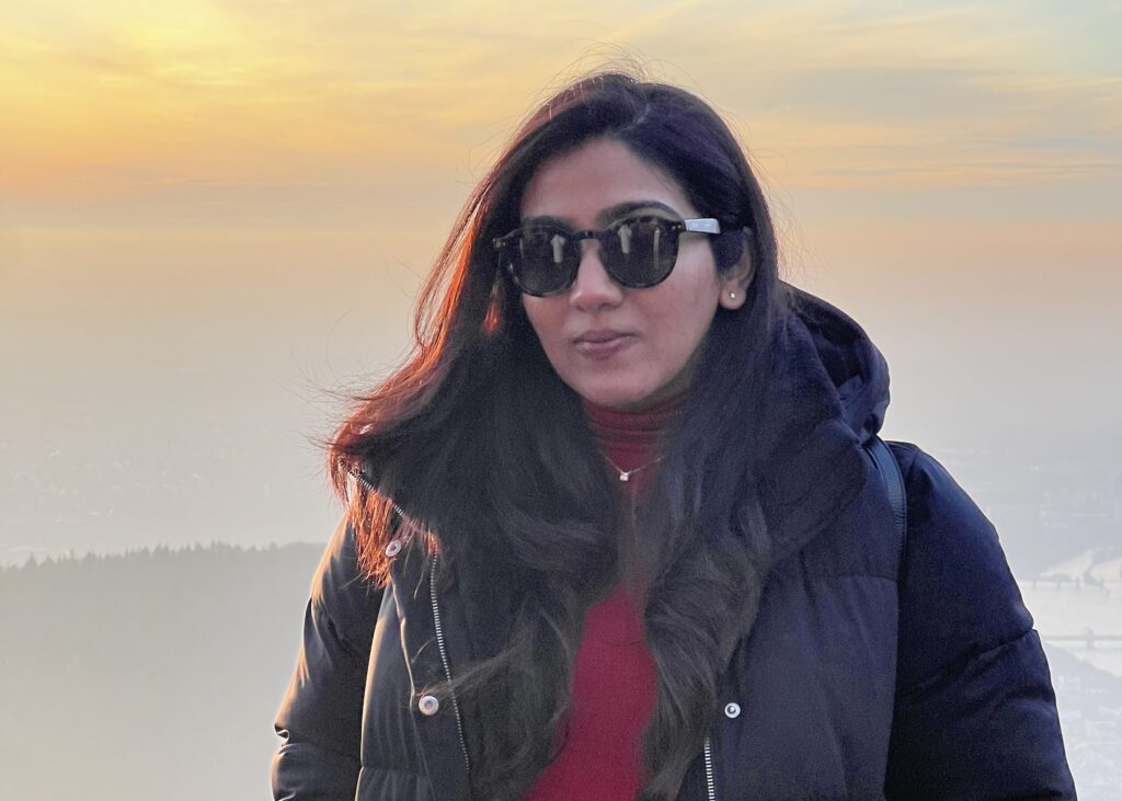 Angelina Jolie spotted strutting through Canary Wharf in a white gown and blonde bob - leaving Londoners stunned while filming her new comedy movie Anxious People.