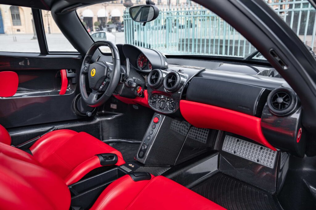 An ultra-rare Ferrari Enzo in a unique silver finish heads to market for €5.3m, with low mileage, full history and elite collector appeal driving intense interest