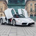 An ultra-rare Ferrari Enzo in a unique silver finish heads to market for €5.3m, with low mileage, full history and elite collector appeal driving intense interest