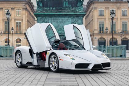 An ultra-rare Ferrari Enzo in a unique silver finish heads to market for €5.3m, with low mileage, full history and elite collector appeal driving intense interest