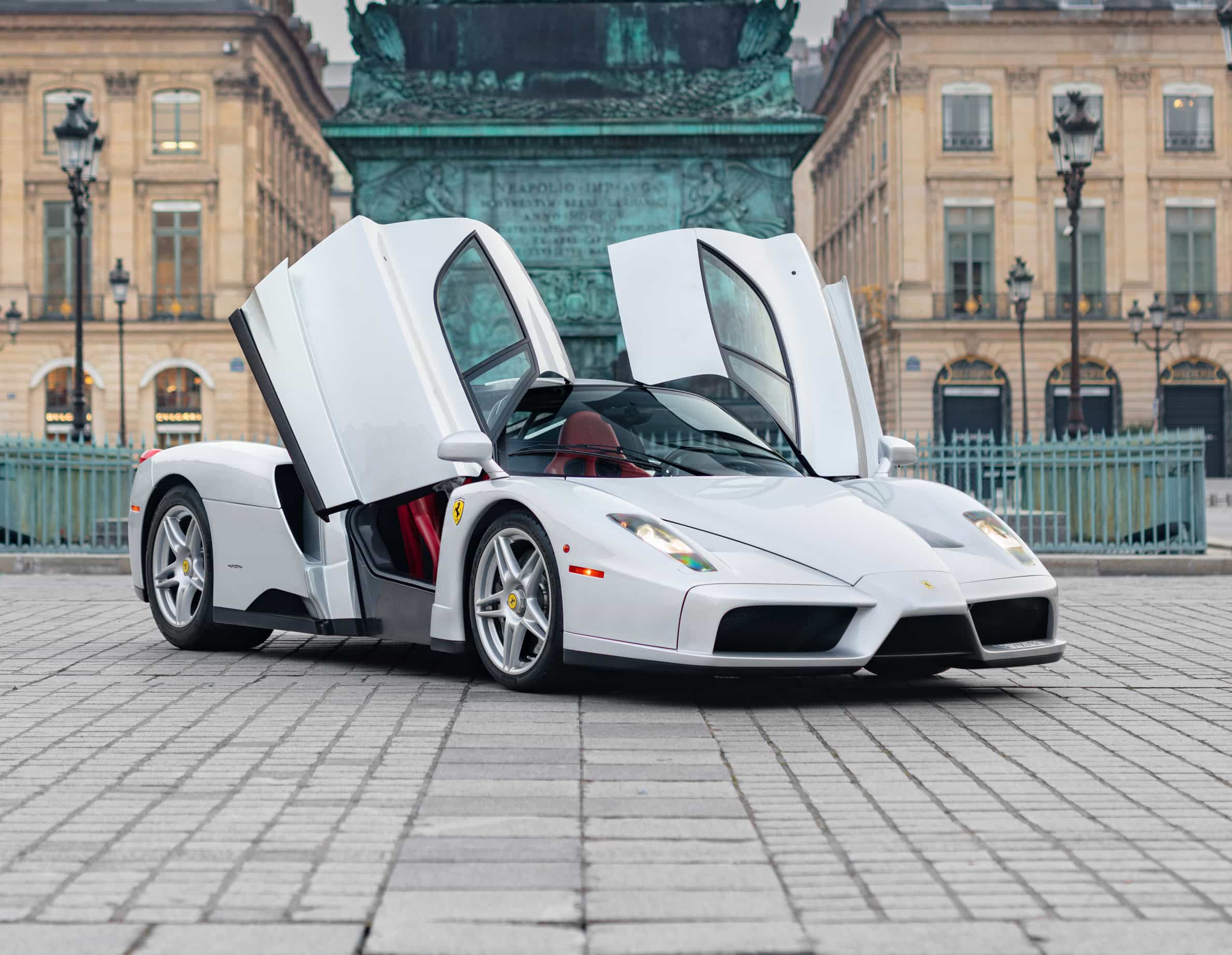 An ultra-rare Ferrari Enzo in a unique silver finish heads to market for €5.3m, with low mileage, full history and elite collector appeal driving intense interest