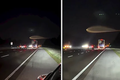 A stunned fisherman claims he spotted an alien UFO hovering above a Florida motorway - pulling out his phone to film the glowing object sparking debate online about SpaceX.