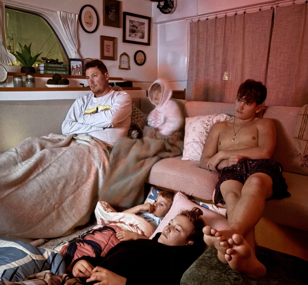 A couple sell their home to live on a catamaran with four kids, cutting bills by 75% while embracing a simpler life filled with travel, challenges and adventure.