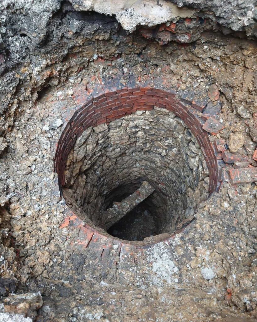 A 2,000-year-old Roman well was uncovered during shop renovations in Caistor, revealing hidden history beneath a Georgian building and sparking hopes for restoration.