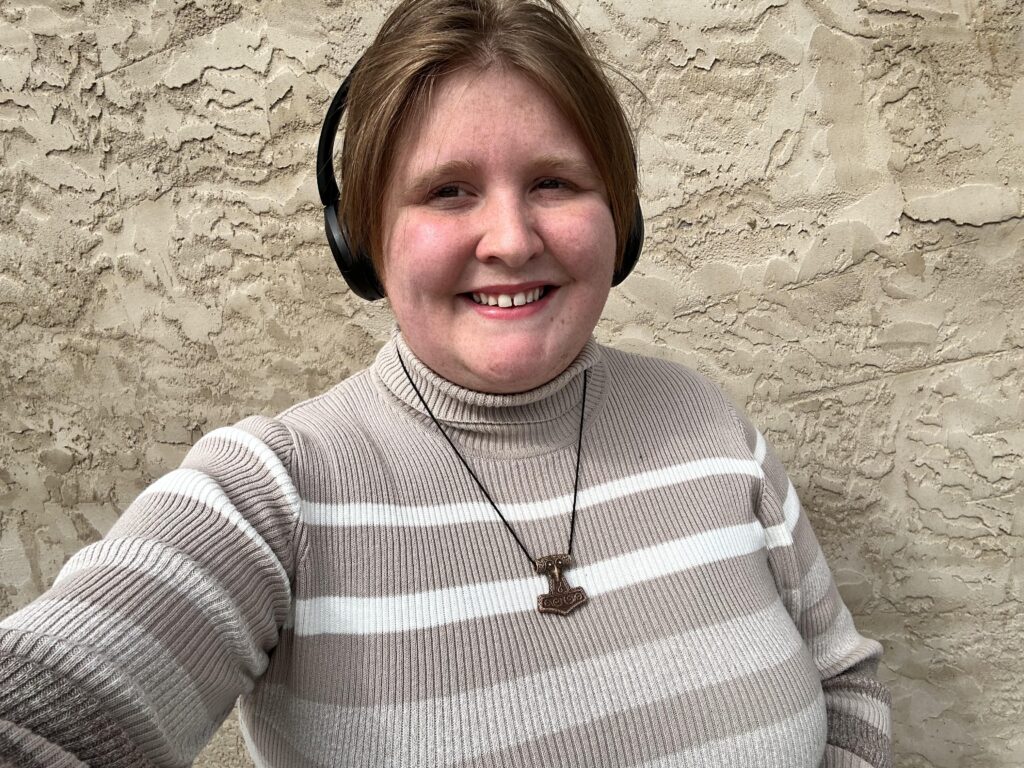 A woman with hirsutism proudly embraces her full neck beard despite cruel comments from strangers and exes who called it disgusting - saying she feels more beautiful and whole.